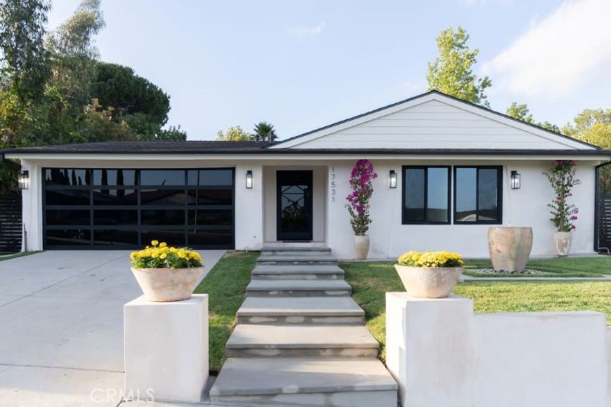 Welcome to this beautiful single - story Granada Hills retreat, offering the perfect blend of comfort, charm and convenience. Situated on a spacious 10,694 sq ft lot, this 4-bedroom, 3-bathroom home spans over 2,097 sq ft of living space with a bright and functional layout ideal for both everyday living and entertaining. 

Step inside to find an inviting living room with a cozy fireplace, seamlessly connecting to a dining area and open kitchen that's ready for your culinary creations. Large windows fill the home with natural light, while sliding glass doors open to a private backyard oasis- perfect for large gatherings, gardening, or simply enjoying the California sunshine.

The primary suite offers a peaceful retreat with its own ensuite bathroom, while the additional bedrooms provide flexibility for family, guests, or a home office. An attached garage adds convenience and storage.

Nestled on a quiet street in the heart of Granada Hills, this property is close to top-rated schools, shopping, dining, and easy freeway access. Weather you are looking to settle into a forever home or invest in a property with incredible ADU potential, this residence is a rare find in a prime neighborhood.

Come and explore more about this piece of gem!