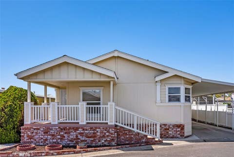 Photo of 2851 Rolling Hills Drive DR #142, Fullerton, CA 92835 (MLS # OC26117966)