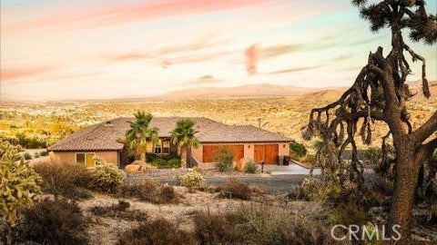 Photo of 7529 Rockaway Avenue, Yucca Valley, CA 92284 (MLS # JT26215724)