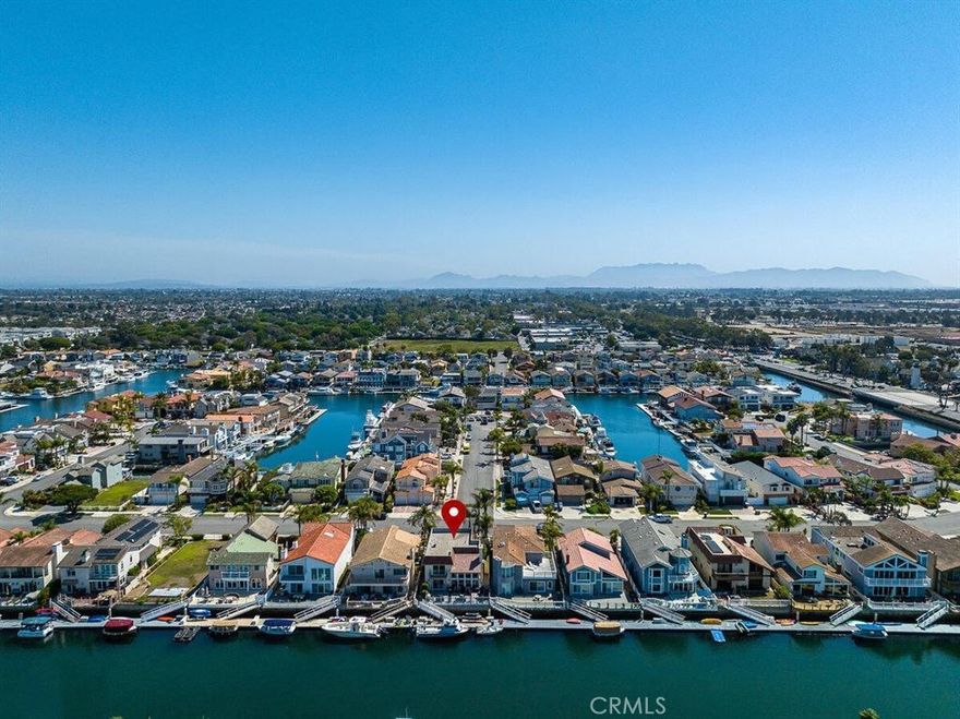 Coastal Luxury Living. Welcome to your dream harbor retreat in the heart of Channel Islands Harbor — where luxury, comfort, and stunning water views meet California coastal living. This beautifully updated 3-bedroom, 3-bathroom waterfront home offers over 2,100 square feet of open-concept living space designed for relaxation and entertaining. Fully paid SOLAR and EV charger. The bright, airy interior is highlighted by vaulted ceilings, large windows, and panoramic harbor views that fill the home with natural light. The gourmet kitchen features sleek stone countertops, high-end stainless steel appliances, and a spacious island perfect for hosting gatherings. The living room opens seamlessly to a private waterside deck with in deck hot tub/spa ideal for morning coffee, evening sunsets, or watching boats drift by. Upstairs, the primary suite boasts a private balcony overlooking the water, and a walk-in closet. Two additional guest bedrooms and bathrooms provide ample space for family or guests. Step outside and enjoy direct access to your private 45 foot boat dock, allowing you to cruise straight from your backyard to the open ocean in minutes. Located in one of Oxnard’s most desirable harbor communities, this home is minutes from the beach, local dining, shopping, and the Channel Islands, offering the perfect blend of serenity and convenience.