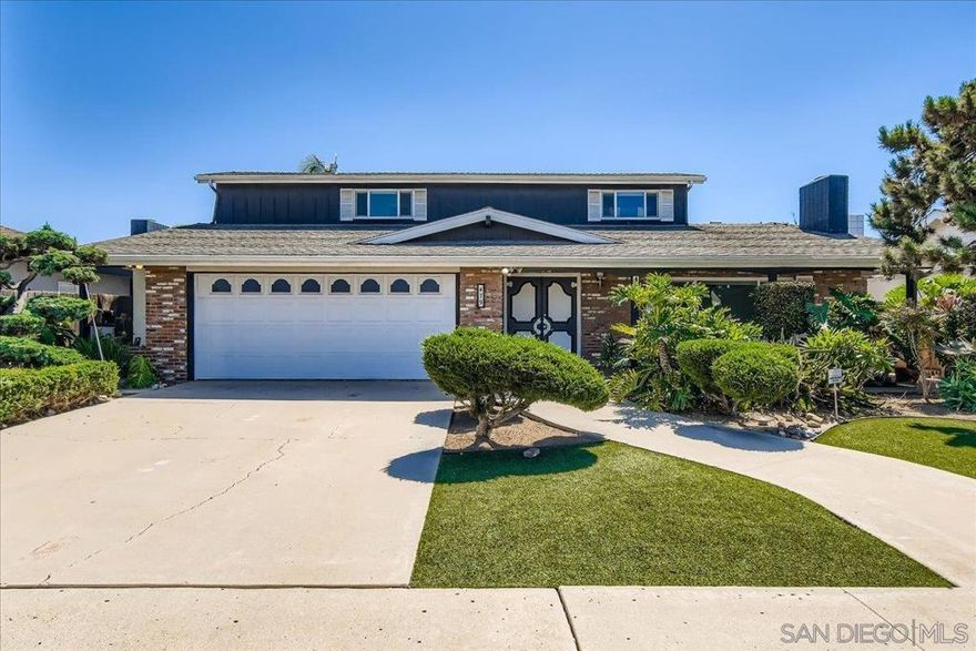 479 Arizona Street is a centrally located 4-bedroom home in Chula Vista. The property has been well maintained, with a manicured lawn and mature landscaping that add to the curb appeal. Inside, you’ll find four generously sized bedrooms and an expansive living area that includes both a formal living room and a separate family room. The layout provides plenty of space for entertaining or for anyone who values larger rooms and flexibility. Large windows throughout fill the home with natural light, and the living room’s brick fireplace adds a classic focal point. The kitchen offers extensive cabinetry, a stainless steel wall oven, and tile countertops. The backyard includes a covered patio, a large fountain, and open space that works well for gatherings or private enjoyment. This is a spacious, well-cared-for home in a prime Chula Vista location.