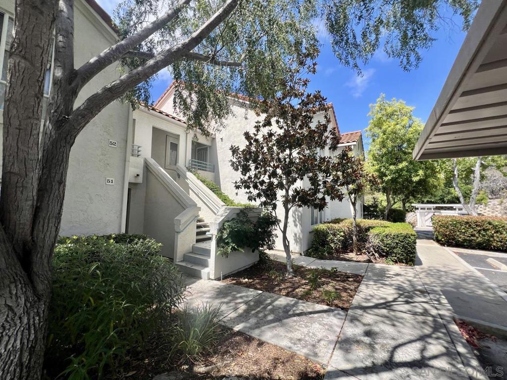 Welcome to your peaceful retreat in a quiet, well-kept community that is just a few short minutes from the 15 freeway, 20 minutes to downtown San Diego, and less than 30 minutes to the beach. This charming condo offers the perfect blend of comfort and convenience. Start your mornings with coffee on the private patio surrounded by mature trees and gentle breezes, or wind down in the evenings by the cozy fireplace. The spacious kitchen is perfect for cooking and baking, with plenty of counter space and a breakfast bar that opens to the dining area, making it a great spot for casual meals or entertaining. Just a short stroll away, you’ll find the community pool and spa, ideal for relaxing weekends or fun with friends. And with plenty of parking available, having friends or family visit is always stress-free. Come see what makes this condo the perfect place to call home.