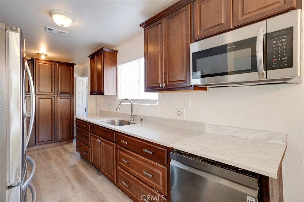 Photo of 15112 Domino Street, Van Nuys, CA 91411 (MLS # BB25183769)