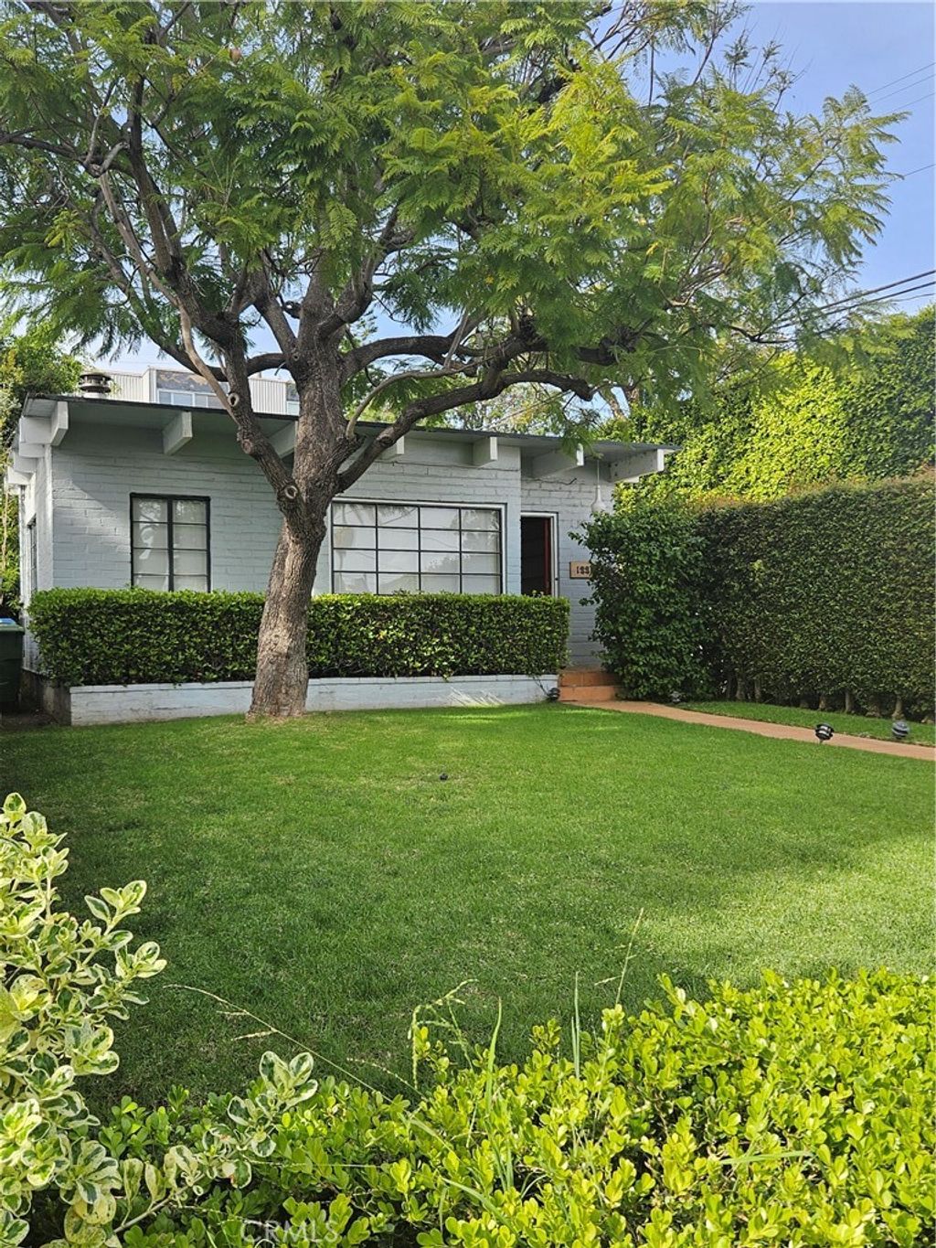 Photo of 12217 Dorothy Street, Los Angeles, CA 90049 (MLS # DW26042313)