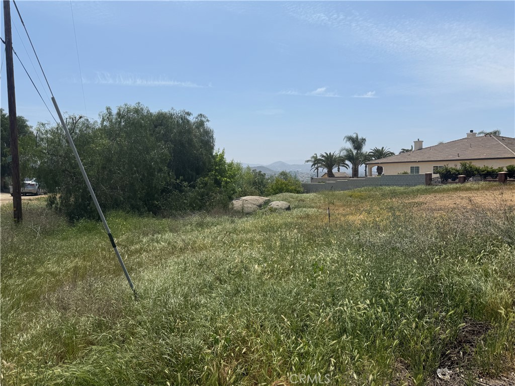 Welcome to Woodcrest and this fantastic piece of land with WATER METER already installed. This neighborhood has beautiful estate-like properties and could be the perfect place to plant your roots with your dream home and shop. Schools, shopping, services and freeway access are nearby.