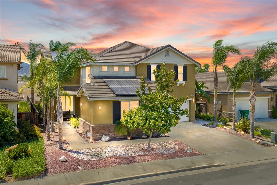 Welcome to this spacious 5-bedroom Murrieta home, thoughtfully designed for comfort, functionality, and multigenerational living. The main level offers a junior suite or primary bedroom with a walk-in shower and closet—ideal for extended family or guests—plus a convenient half bath for visitors. Enjoy both formal and informal dining and living areas, perfect for entertaining or everyday gatherings. The kitchen features granite countertops, a walk-in pantry, abundant storage, and a built-in desk—perfect for homework or a home office.
Upstairs, a cozy loft greets you at the landing, leading to two bedrooms that share a hallway bath, another junior suite with its own bath, and the primary retreat. The spacious primary bedroom boasts wood-like tile flooring (no carpet), a soaking tub, and a generous walk-in closet. An upstairs laundry room with a sink and ample hallway storage adds everyday convenience.
The backyard is a private oasis with no rear neighbors, a covered patio, a fire pit, lush grass, and mature palm trees—perfect for enjoying both sunsets and sunrises. A 3-car garage offers plenty of space, and solar is to be assumed by the buyer.
Ideally located near Loma Linda University Medical Center, Kaiser Permanente, and the 215 Freeway, this home offers easy access to major destinations. Shopping is a breeze with Costco on Clinton Keith, Target, and numerous other retail centers just minutes away, giving you several convenient options for dining, groceries, and entertainment. With beautiful curb appeal, a large lot, and a floor plan that blends style and practicality, this home is a true Murrieta gem.