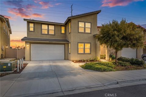Photo of 1176 Woodbury Lane, Mentone, CA 92359 (MLS # CV26079707)