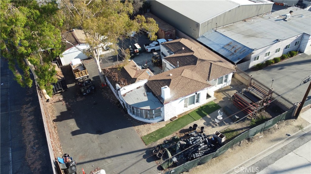 Now available in the heart of Pomona, this versatile contractor yard is ideal for owner-users or investors seeking a property with built-in functionality for trade operations. Situated on a generous 12,004 SF lot, this 1,782 SF structure was originally built in 1946 and currently serves as an owner-user office with paved and fenced yard space. The property features an oversized 2-car garage, paved and fenced yard, and ample room for truck and equipment parking. Located near the 71, 60, and 10 freeways, the site offers excellent access for logistics, crews, and deliveries.
