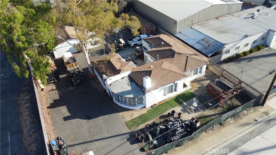 Now available in the heart of Pomona, this versatile contractor yard is ideal for owner-users or investors seeking a property with built-in functionality for trade operations. Situated on a generous 12,004 SF lot, this 1,782 SF structure was originally built in 1946 and currently serves as an owner-user office with paved and fenced yard space. The property features an oversized 2-car garage, paved and fenced yard, and ample room for truck and equipment parking. Located near the 71, 60, and 10 freeways, the site offers excellent access for logistics, crews, and deliveries.