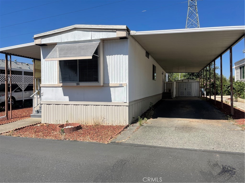 Located in Oroville's Premier 55+ Manufactured Home Communities! Close to all stores, Hospital, Casino's and beautiful Lake Oroville. This home is waiting for a little shining up but what a super deal! Well located and quiet. The amenities in this park are amazing! There is an in-ground pool, game room, club house, fitness room, Boat/RV storage and is very in a very nicely maintained park. At this price, you better hurry!