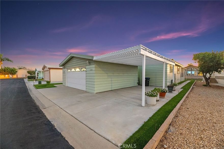 FHA and VA financing available! Welcome to Eastlake, a vibrant 55+ community where you own the land. This beautiful home offers over 1,800 square feet with 3 bedrooms and 2 bathrooms, providing ample space and comfort. The primary suite features a private bathroom with dual sinks, a walk-in shower, and a walk-in closet. The property also includes a convenient oversized two-car garage, driveway for an additional vehicle, and a low-maintenance yard with artificial turf. As a resident, you’ll enjoy amenities designed for an active lifestyle. Take a dip in the sparkling pool, relax in the spa, challenge friends to a game of tennis or pickleball, or enjoy billiards. Golf enthusiasts will love having a course just across the street. Eastlake offers a warm, welcoming atmosphere perfect for those young at heart seeking both recreation and social connection. Don’t miss your chance to make this exceptional home yours. Move right in and start enjoying all that Eastlake has to offer. Schedule your showing today!