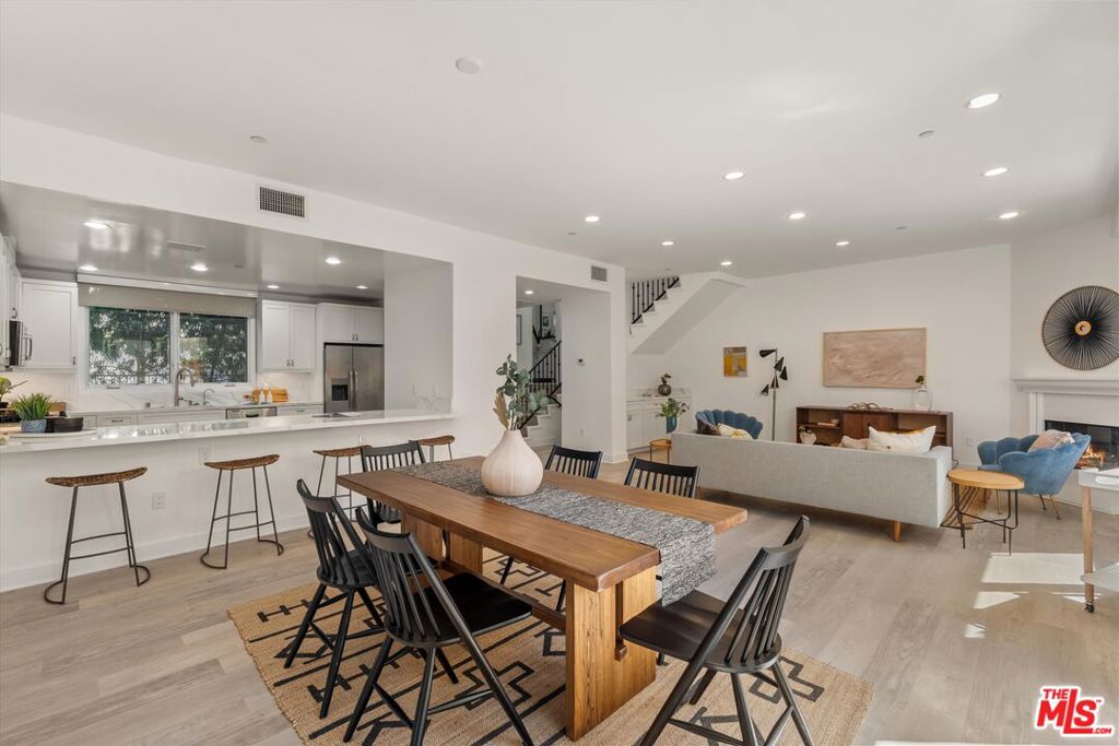 Welcome to 1032 Third Street, Unit #103 a rare and spacious 2,500 sq ft, 3-bedroom, 3.5-bath luxury townhome located in one of Santa Monica's most coveted neighborhoods: the chic and vibrant Wilshire-Montana district. Just blocks from the iconic Santa Monica Bluffs and moments to the shops, cafes, and restaurants of both Montana Avenue and Wilshire Boulevard, this home is perfectly positioned for an exceptional coastal lifestyle. This beautifully maintained residence offers an expansive, sun-filled interior with beautiful natural light throughout and refreshing ocean breezes flowing in from the nearby coast. The updated kitchen features stainless steel appliances and a large center island that opens seamlessly to the generous living and dining areas. A private patio extends off the main living space, perfect for indoor-outdoor entertaining and relaxing.All three bedrooms are en suite and impressively sized offering far more space and comfort than typically found in townhomes. The oversized primary suite features soaring ceilings, exceptional light, and a spa-like bath with dual vanities, soaking tub, and separate shower. A private rooftop deck with views offers a peaceful outdoor retreat. Additional highlights include a private, direct-access 2-car garage, bonus storage area, and entry through a gated, secured building. Constructed in 2007, the property showcases quality craftsmanship and solid construction in a community known for its exceptional maintenance and quiet, residential feel. Situated north of Wilshire and south of Montana Avenue, this townhome is moments from Palisades Park, the Bluffs, top-rated schools, and Santa Monica's best shopping, dining, and markets. With a rare blend of space, light, privacy, and location, this is Santa Monica living at its finest and truly one of a kind on the market today. SELLER FINANCING AVAILABLE!