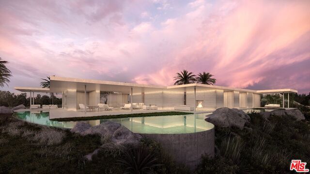 Here's your chance to build on the last incredible lot in Trousdale with the absolute best views it has the offer on, the one and only, Billionaire's Row. With unobstructed views stretching from Downtown LA to the Pacific Ocean, this vacant land is the ideal development opportunity. Fully engineered architectural plans designed by award winning Architects Shubin + Donaldson are ready to submit to the city. The planned 24,500+ SF 7 bed, 14 bath residence is a vision of elegance & sophistication. Welcoming pools of water embellish the exterior threshold, which flows seamlessly to the sleek glass foyer with expansive views and a lavish acrylic bottomed pool. An entertainer's dream, with a professional bowling alley, nightclub, bar, theater, salon, gym, wellness center & a 140-ft long vanishing edge pool that runs the entire length of the palatial estate. Pre & post-construction acquisition opportunities available. Turn Key $100M. Land with plans $35.995M Property is currently vacant land.