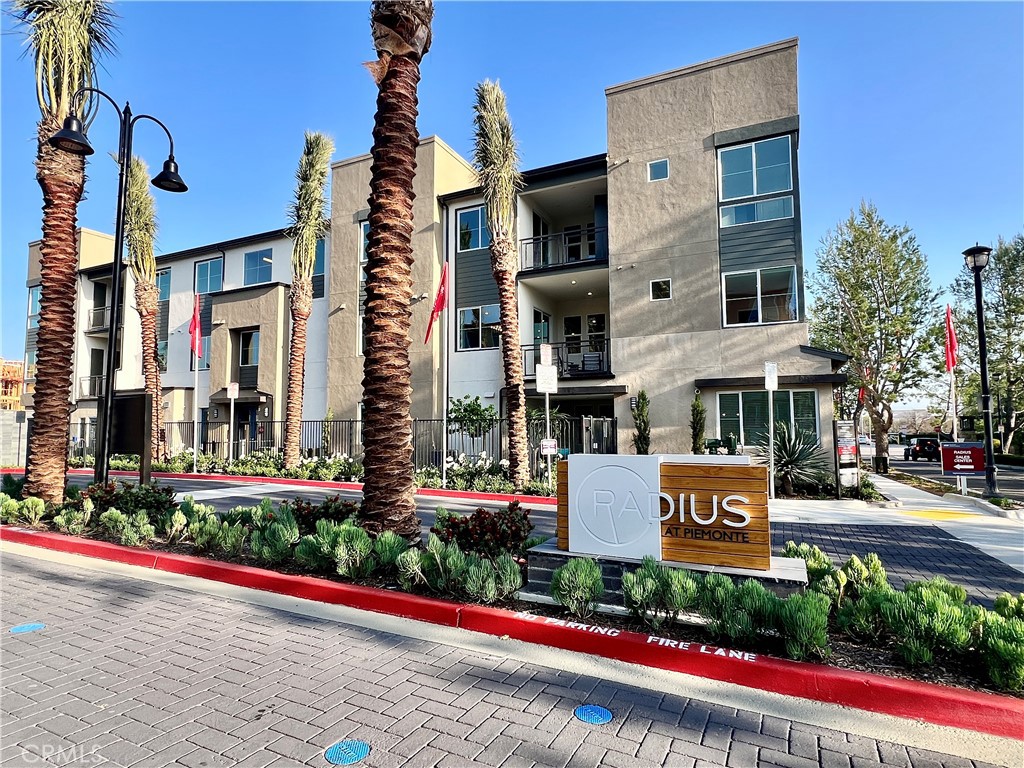 Welcome to your ALMOST NEW recently built condo in the newly built Radius Community in Ontario! This upscale and modern one bedroom, one bathroom home boasts comfort and style while offering everything you need. Drive through this gated community and into your two car tandem garage attached for added security. This unit is located on the second floor and even includes a storage unit down the hallway. Step inside to discover an inviting open living space that opens to the kitchen and dining area, filled with natural light, brand new vinyl flooring and access to the outdoor balcony for that urban living space. The spacious kitchen features an island with space far barstool chairs and brand new appliances including a stove, microwave, dishwasher and refrigerator. Down the hallway you will find your indoor stackable washer and dryer, never before used. Your brand new bathroom features spacious countertops and a beautiful step in shower. Retreat to your bedroom with brand new carpet for relaxation and privacy complete with a wall closet. Enjoy the California sunshine in the beautifully designed community pool, spa and bbq area, perfect for outdoor gatherings or quiet relaxation. Park your vehicles with ease in your attached two car garage or in guest parking around the pool area. This community boasts exceptional location with convenient access to the Toyota Area, Eureka Burger, Ontario Mills, Target, Top Golf, the Ontario International Airport and so much more! Don't miss out on the opportunity to make this your new home today! The rental price includes HOA fees and utilities. Home has central AC and heat and is connected to solar. Tenant to pay internet/cable separately. Small dogs may be considered. Make an appointment to tour today.