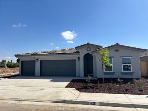 Photo of 1225 Via Valencia Drive, Madera, CA 93637 (MLS # FR25276349)