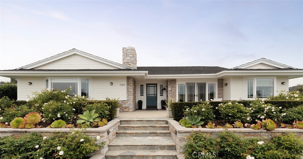 Spanning over 3,000 square feet, this light filled residence features 4 spacious bedrooms and 3.5 beautifully appointed baths. An open floor plan includes a grand great room, elegant dining area, and a chic wet bar that flows seamlessly to a private backyard retreat, perfect for entertaining or quiet relaxation. The chef’s kitchen is a true showpiece, boasting professional grade stainless appliances, a 6-burner range, floating shelves with a striking tile backsplash, a water filtration system, and a charming breakfast nook with a bay window. The luxurious primary suite is a private sanctuary with direct patio access, a spa-inspired bath with soaking tub, walk-in shower, makeup vanity, and an expansive walk in closet. Two guest bedrooms share a stylish dual-vanity bath, while a fourth en-suite bedroom offers flexibility as a guest suite or home office. Thoughtful design elements include coffered ceilings, rich ¾-inch Merbau hardwood floors, custom cabinetry, oil-rubbed bronze hardware, dual-zone HVAC, and a full security system. A dedicated laundry room adds convenience with built-in storage, wash basin, and side entry. Enjoy the serenity of your sun-drenched backyard with a sparkling pool, or engage with neighbors from your charming front patio. Enjoy the serenity of your sun-drenched backyard with a sparkling pool, or engage with neighbors from your charming front patio. Just minutes from Balboa Island, world renowned shopping at Fashion Island, Whole Foods, the Newport Beach Country Club, and the boutiques of Corona del Mar Village, this is a rare offering in one of the most sought after communities on the California coast.