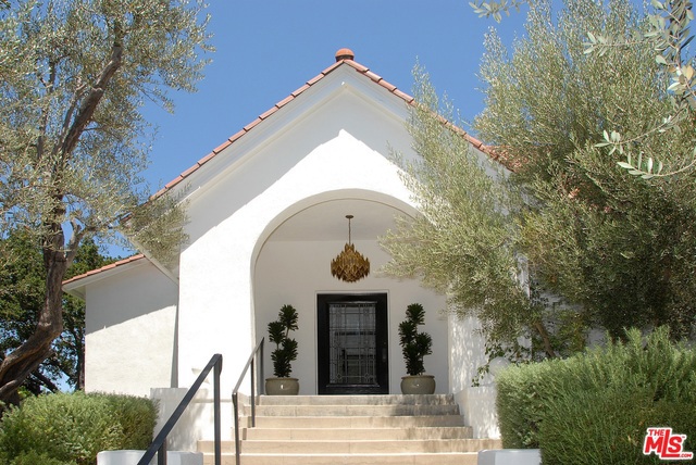One of the 2 original estates built in the gated enclave of Laughlin Park, this extraordinary property boasts a rich Hollywood history. Built in 1915 by architect William J. Dodd, the property was once home to Charlie Chaplin and his wife Mildred Harris, and later to silent movie star Anita Stewart. Legendary filmmaker Cecil B. DeMille purchased the estate in 1920, combining it with his home next door. It served as his production office, screening room and guest house until his death in 1959. Both homes remained in the DeMille family until the 1980's, and were later detached and returned to their original status of two separate residences. Careful renovations have faithfully maintained the estate's rich history and architecture, while incorporating comfortable modern touches for today's lifestyle. Flooded with natural light, the home features 4 bedrooms, 5 ½ baths, screening room, an exceptional master retreat, outdoor loggias and a beautiful pool & spa. Set on over half an acre.