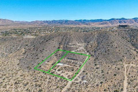 Photo of 7995 Jericho, Yucca Valley, CA 92284 (MLS # JT25259485)