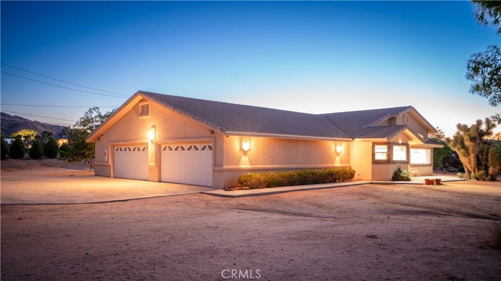 Photo of 8920 Del Monte Avenue, Yucca Valley, CA 92284 (MLS # IG26066935)