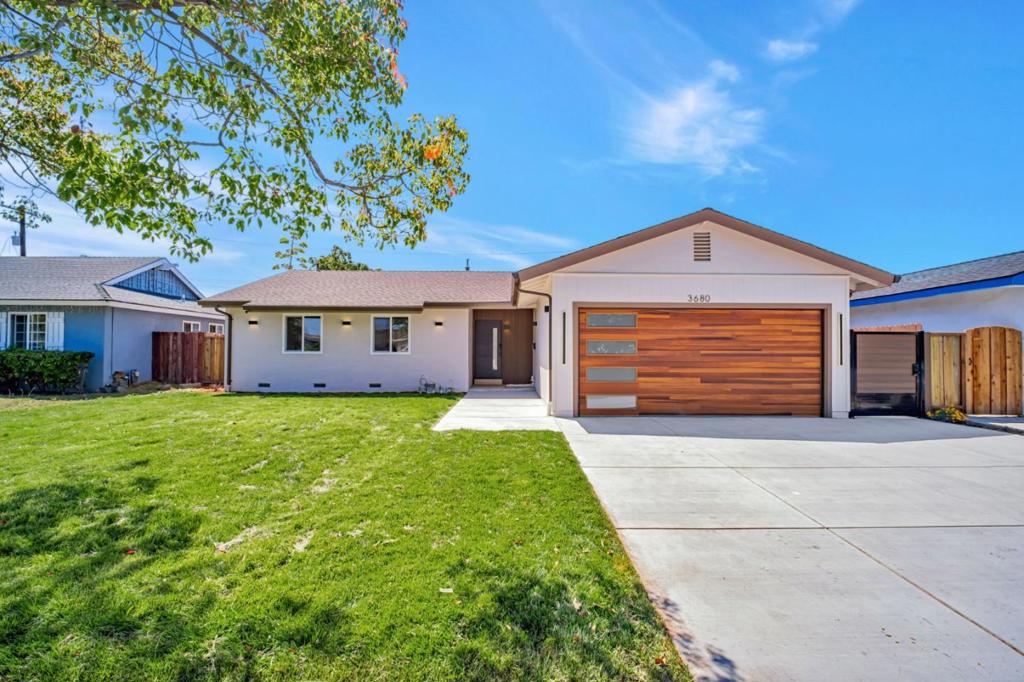 Welcome to this stunning, completely remodeled 4-bedroom, 2-bathroom home nestled in a desirable Fremont Irvington neighborhood. Thoughtfully updated with designer finishes throughout, this home offers modern living with a touch of elegance. Step inside to discover an open-concept layout featuring a spacious great room and a chef-inspired kitchen with sleek cabinetry, quartz countertops, and stainless steel appliancesperfect for entertaining and everyday living. Enjoy the seamless indoor-outdoor flow to a beautifully landscaped backyard, ideal for relaxing or hosting guests. The home also boasts a finished garage, new concrete driveway, and fresh concrete work around the property for enhanced curb appeal and convenience. Every detail has been consideredfrom the tasteful interior upgrades to the refreshed exterior. This move-in-ready home combines style, function, and comfort in one perfect package. The home features a functional combination of flooring materials, and a fireplace adds a touch of warmth and ambiance to the living area. Situated within the Fremont Unified School District, this property provides a practical location for those with school-aged children. Experience the blend of comfort and functionality this Fremont home has to offer.