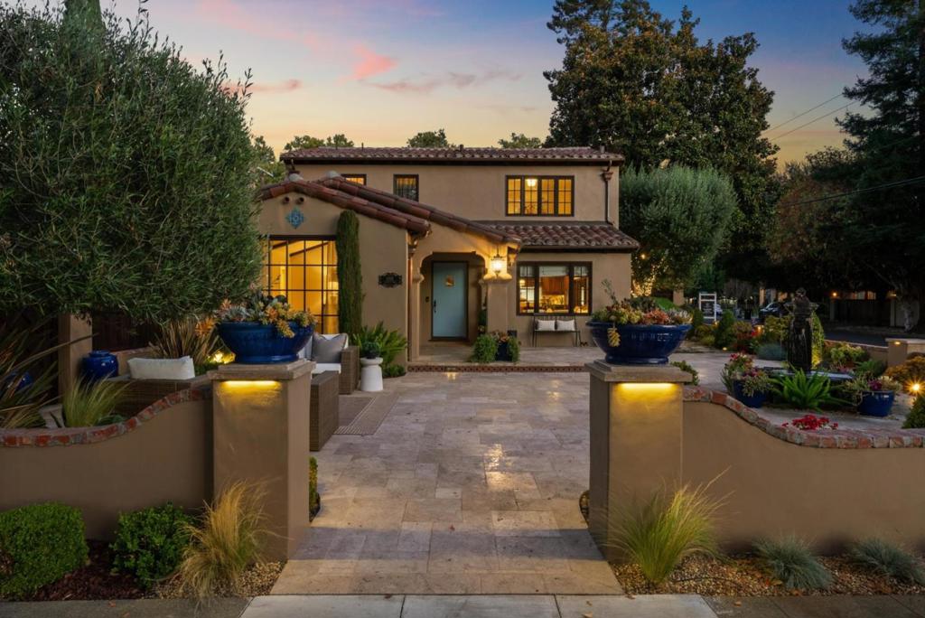 Prime Willow Glen location on a rare 12,035 sq. ft. lot, Main Home is 4 Bedrooms with the primary bedroom on the first floor, and a private Office, 2.5 Baths, 2,582 sq.ft. Plus a 796 sq.ft Permitted Casita boasts 1 bedroom and 1 full bathroom, great room, full gourmet kitchen, and laundry closet, 361 sq.ft. basement and a 528 sq.ft. detached 2-car garage. All just a short stroll to vibrant Downtown shops, dining, and events! This stunning Tuscan Revival estate blends character with modern luxury and resort-style living. At its heart is a custom-designed casita featuring vaulted ceilings, designer chandelier, Venetian plaster, bi-fold doors opening to the pool and spa, perfect for guests, extended stays, or entertaining. Outdoor living shines with a rebuilt smart-controlled pool/spa, Napa-style outdoor copper shower, custom pergola with premium grill, and lush landscaping with fruit trees. The main home boasts updated systems, a spacious basement, water softener, tankless water heater, and solar panels. Detached oversized 2-car garage with Tesla charger and attic storage. Secure, architecturally distinctive fencing ensures privacy while enhancing curb appeal. A rare opportunity to own a true Willow Glen estate in a walk-everywhere location. Stroll to Downtown Willow Glen!