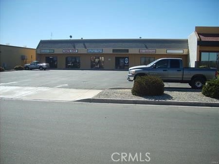 Photo of 21065 Bear Valley RD, Apple Valley, CA 92308 (MLS # CV26145770)