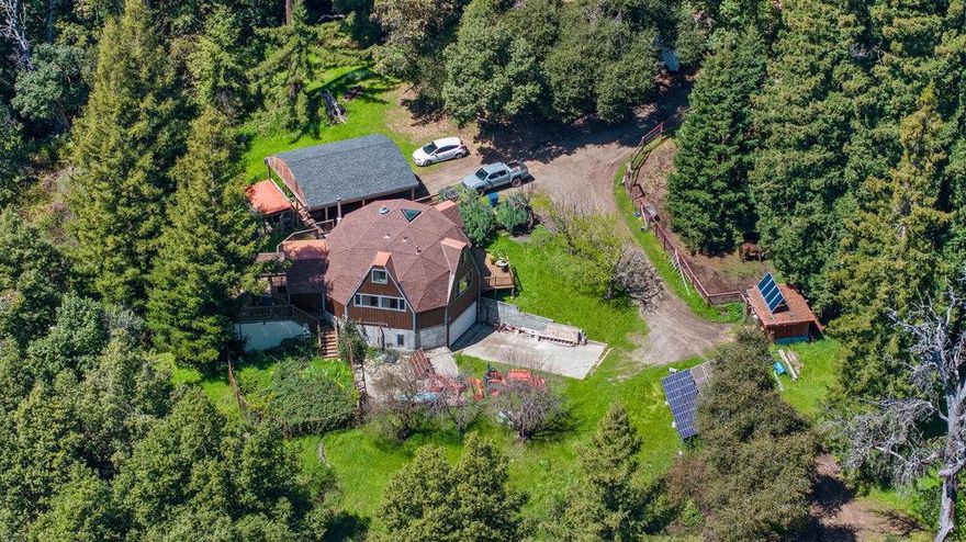 Set amidst the serene landscapes of Corralitos, 2900 Buzzard Lagoon presents an unparalleled living experience. This geodesic dome spans a generous area. Included in the sale are 2 parcels totaling nearly 18 acres. This domicile exemplifies the quintessence of tranquility and enchantment, tailor-made for those searching for a sanctum away from the cities hustle and bustle. Yet, you are still very well connected. This property features Starlink, which allows you to surf, stream & work from home on this high speed internet! As you traverse the driveway, the estate unveils itself in an artistic blend of architectural elegance and environmental beauty. The exterior facade exudes an inviting allure, with a mix of textures and colors harmoniously intertwined with the surrounding greenery.  Upon entry, natural light streams in through the brand new windows, embracing every corner of the open living area. The wrap around deck has recently been improved, so you can enjoy endless time basking in the natural beauty of the outdoors. This property lends itself to horses, hikes in nature, adventure and relaxation. Plus the oversized garage is perfect for the hobbyist in us all! 2900 Buzzard Lagoon is not just a residence but an embodiment of restful lifestyle draped in natures best offerings.