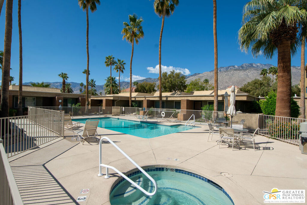 Don't miss this opportunity to own an affordable vacation home, full time residence or investment property on Fee Land in Central Palm Springs! Close to the airport, dining, shopping and downtown, you will love the well appointed furnishings of this condominium which is being sold Turnkey. Completely remodeled in 2024, this  reimagined home offers open concept living allowing for maximum enjoyment while entertaining friends, family or just relaxing alone. Two spacious bedrooms, in unit washer-dryer and a private courtyard patio provide convenience and privacy. Relax in the Oasis like setting in this beautifully maintained desert landscaped community where the pool and spa are just steps away. Hurry - this one will not last!