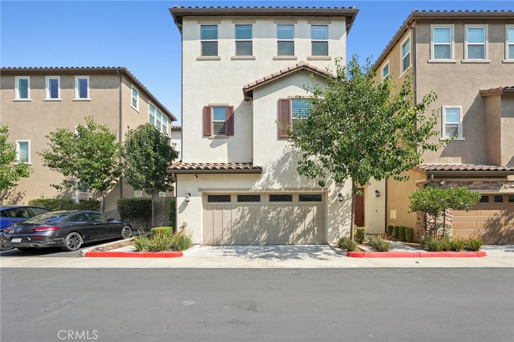GATED • PAID OFF SOLAR INCLUDED • NO MELLO-ROOS • LOW HOA FEE
Welcome to Pacific Villas—Baldwin Park’s newest gated community, where luxury meets convenience. This stunning 4-bedroom, 4.5-bath Plan 3 home offers a thoughtfully designed layout with each bedroom featuring its own private full bath, plus a stylish powder room on the second floor.
The first floor includes two bedrooms, perfect for guests or multigenerational living. The second floor features the gourmet kitchen, dining area, spacious living room, laundry room, and a third bedroom. The top floor is reserved for the private primary suite, complete with a relaxing retreat, a generous walk-in closet, and a spa-inspired bath with dual vanities, a luxurious free-standing tub, and a spa shower. Enjoy your own spacious balcony with neighborhood views.
Upgrades include paid-off solar panels, Kona cabinetry, quartz countertops with designer backsplash, hand-set ceramic tile flooring, and premium electrical enhancements,Kitchen island with bar seating creates the perfect space for entertaining. and plantation shutters for a timeless touch.
Community amenities feature a gated entrance, scenic paseo, and private dog park