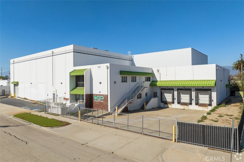 An approximate 36,670 square feet industrial freestanding building, featuring heavy power and clear heights up to 42 feet. The concrete tilt-up and masonry buildings provide 1,600 amps of 480/277 volt three-phase power, equivalent to 3,200 amps of 240/120 volt three-phase power. The facility includes around 3,200 SF office space and three dock-high loading platforms with levelers and one ground-level loading door. Lease includes an approximate 10,650 SF cement paved and fenced lot right across the building. Building is also available for Sale.