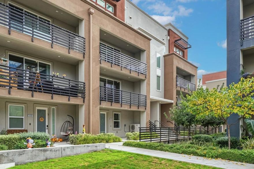 Built in 2022, this 3BD/3BA townhome combines contemporary design with functional luxury in one of Dublin's most desirable communities. The property shows minimal wear and presents in near-new condition. A bright open layout with soaring ceilings and abundant windows defines the main living level. Selected images use virtual staging to demonstrate furnishing possibilities; no structural or physical features have been altered.  A private first-floor suite provides flexibility for guests, office use, or multi-gen living. The kitchen integrates directly with the dining and living areas, supporting efficient daily use. The primary suite features a walk-in closet and a spa-style bath with a dual-sink vanity.  Notable upgrades include a 2-car garage with dual EV chargers, a water softener, and solar panels for energy efficiency. Community amenities include a pool, fitness center, clubhouse with kitchen, conference rooms, billiards, and table tennis.  The location offers direct access to shopping, BART, parks, and the outlets. Zoned for top-rated Dublin schools, including Dublin High, with the new Shamrock Hills School scheduled to open in 2026.