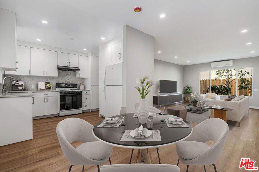 Welcome to 4023 Lincoln Avenue #2 a thoughtfully updated 2-bedroom, 1-bath residence offering modern comfort and convenience in the heart of Culver City. Spanning approximately 1,065 square feet, this bright and spacious unit features brand-new upgrades including cushioned 22-mil LVP flooring throughout, kitchen with a 20 cu. ft. Whirlpool refrigerator plumbed for a water-line, well-designed cabinetry with two drawered pantries, quartz counters and backsplash, stainless steel sink, slimline garbage disposal and touchless Delta kitchen faucet; bathroom hardware & fixtures, drawered bathroom vanity cabinet with quartz countertop and whisper-quiet bathroom fan & heater; in-unit LG ultra-large capacity, wifi enabled, washer and dryer with Turbo wash & steam; tankless, smart Rinnai water heater that learns your schedule; energy-efficient, zoned heating and cooling with a 3-head Mitsubishi mini-split system; sound-dampening ceiling insulation for better energy efficiency, and new blinds to be installed before move-in. This unit also includes a Bosch SilencePlus dishwasher, large mirrored closets, and additional storage cabinets in the bedrooms and closets, as well as a semi-private back patio area for your personal use. This residence also offers optional covered parking and easy access to the best of Culver City - living in the heart of downtown, walking distance to the hottest restaurants, the Culver Steps, Baldwin HIlls Scenic Overlook and the Culver Stairs, Sony Pictures Studios, The Culver Hotel, and the weekly Farmers Market. You are also moments away from The Platform, Helms Bakery and Arts Districts, top-rated schools, and major commuter routes. This home perfectly blends modern living with an unbeatable location (walkscore is 96 out of 100).