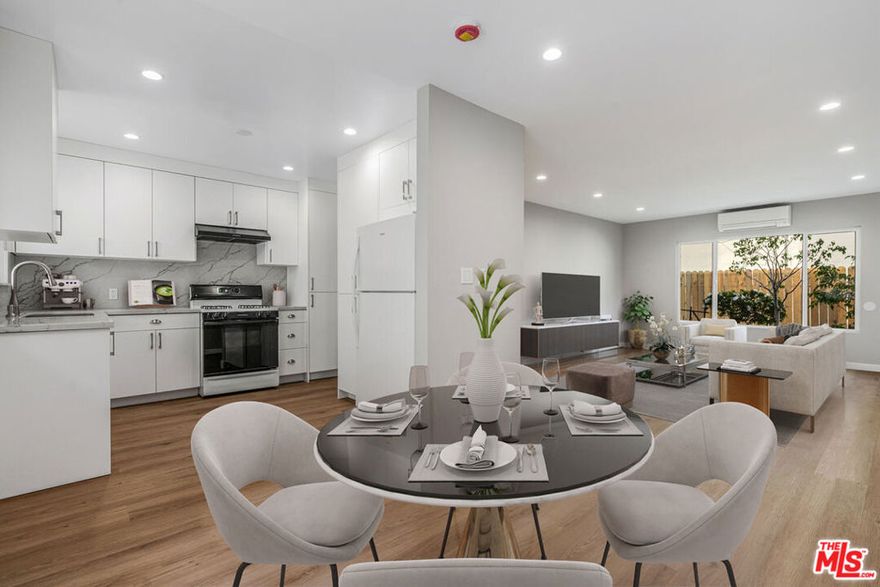 Welcome to 4023 Lincoln Avenue #2 a thoughtfully updated 2-bedroom, 1-bath residence offering modern comfort and convenience in the heart of Culver City. Spanning approximately 1,065 square feet, this bright and spacious unit features brand-new upgrades including cushioned 22-mil LVP flooring throughout, kitchen with a 20 cu. ft. Whirlpool refrigerator plumbed for a water-line, well-designed cabinetry with two drawered pantries, quartz counters and backsplash, stainless steel sink, slimline garbage disposal and touchless Delta kitchen faucet; bathroom hardware & fixtures, drawered bathroom vanity cabinet with quartz countertop and whisper-quiet bathroom fan & heater; in-unit LG ultra-large capacity, wifi enabled, washer and dryer with Turbo wash & steam; tankless, smart Rinnai water heater that learns your schedule; energy-efficient, zoned heating and cooling with a 3-head Mitsubishi mini-split system; sound-dampening ceiling insulation for better energy efficiency, and new blinds to be installed before move-in. This unit also includes a Bosch SilencePlus dishwasher, large mirrored closets, and additional storage cabinets in the bedrooms and closets, as well as a semi-private back patio area for your personal use. This residence also offers optional covered parking and easy access to the best of Culver City - living in the heart of downtown, walking distance to the hottest restaurants, the Culver Steps, Baldwin HIlls Scenic Overlook and the Culver Stairs, Sony Pictures Studios, The Culver Hotel, and the weekly Farmers Market. You are also moments away from The Platform, Helms Bakery and Arts Districts, top-rated schools, and major commuter routes. This home perfectly blends modern living with an unbeatable location (walkscore is 96 out of 100).