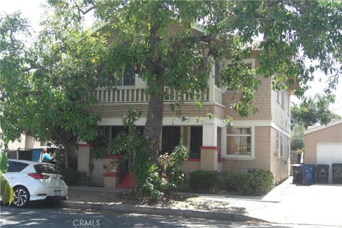 Photo of 3846 S Gramercy Place, Los Angeles, CA 90062 (MLS # SB26154987)