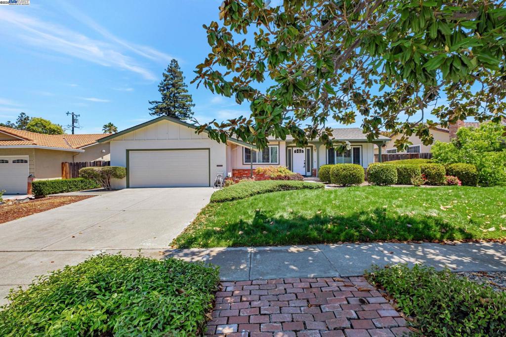 Welcome to this newly renovated home on quiet, low-traffic Sully Street—just minutes from top-rated Mission San Jose High School, Hopkins Junior High & Chadbourne Elementary. With easy access to I-680 & Silicon Valley, it’s perfectly situated for convenience & lifestyle. Renovated in July 2025 & kept vacant to maintain its pristine condition, this home features an open floor plan w/ premium waterproof laminate wood flooring, fresh interior paint & recessed lighting with dimmer switches throughout. The brand-new kitchen showcases white shaker cabinetry, quartz countertops, and LG stainless steel appliances—all new with tags—including a refrigerator, oven, gas cooktop, dishwasher & microwave/hood. Both bathrooms have been completely remodeled w/ walk-in showers, updated vanities, quartz counters, stylish fixtures, and modern lighting. The spacious primary suite includes a walk-in closet & peaceful views of the landscaped backyard, featuring a rose garden and mature lemon & orange trees. Additional highlights include an attached garage w/ newer washer and dryer, a state-of-the-art Rainbird sprinkler system & a variety of ornamental trees in both the front & back yards. A true turnkey gem in one of Fremont’s most desirable neighborhoods! Open House Sat (7/26) & Sun (7/27) 1pm to 4pm