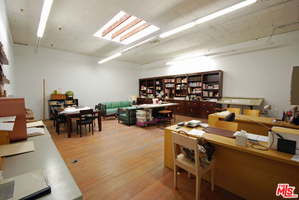 800 SF Boyle Heights creative studio available for lease at 2939 E. Pico Blvd., Studio 2C. This air-conditioned space is comprised of a open studio area and a window-lined office, both with wood plank flooring. Located on the second floor of a mid-century industrial building, Studio 2C is fully air conditioned and features original, vintage wide-plank wood floors and includes one-car parking. It shares a common kitchen, restroom and mop sink with only six other studios. Ideal for use as an artist studio, design, photography or creative office. Not suitable for live/work, cannabis, recording studio or any uses that would generate excessive noise or foot traffic. It is a second-floor space accessed by a wide staircase; there is no elevator. Available for a minimum one-year term for $1,500 per month, plus electric. Prime Boyle Heights location, one block east of Soto St. and four blocks from the Sears Development, and just minutes from DTLA and the Arts District. Only mile to the East LA Freeway Interchange and access to the (5), (10), (101) & (60) Freeways.