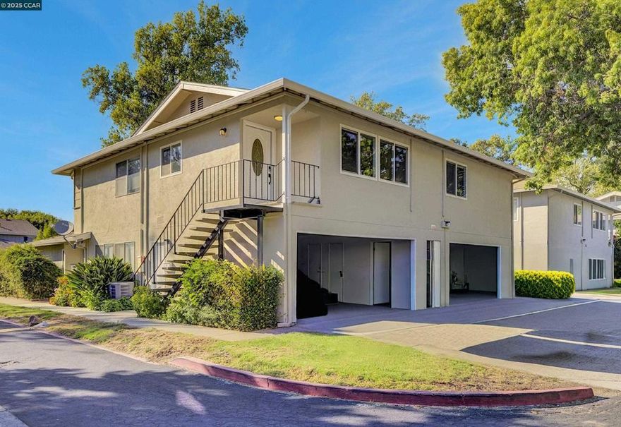 Bright, modern, and move-in ready! This 2-bedroom, 1-bath upper-level end unit offers 854 sq. ft. of comfortable living in a prime location. Step inside to find an updated kitchen with sleek stainless steel appliances...refrigerator included, LVP flooring, and fresh interior paint throughout. Thoughtful details like updated baseboards, black door handles and hinges, plus modern switches and outlets, create a stylish contemporary vibe. The open living and dining areas are filled with natural light, making the space feel warm and inviting. The bathroom has been refreshed with a chic vanity for a clean, stylish look. Enjoy peaceful views of the greenbelt area and sparkling community pool right from your windows. This condo also comes with a 2-car garage space shared with a neighbor, a convenient storage closet, and access to a shared laundry room in the garage area. Located just minutes from shopping, restaurants, and easy Hwy 242 access, this condo offers both comfort and convenience—perfect for first-time buyers, downsizers, or anyone looking to simplify without compromising style.