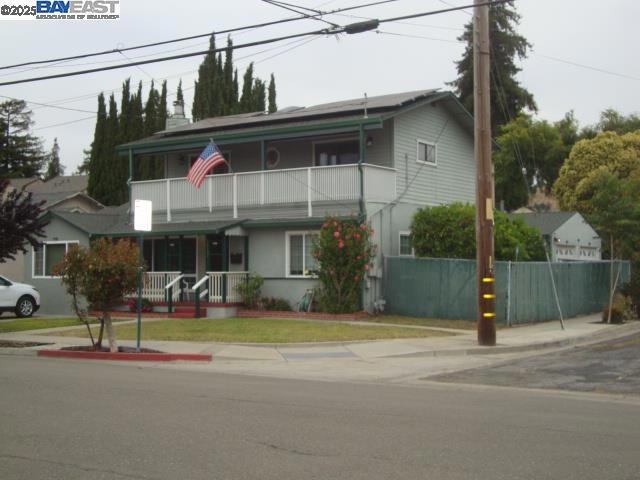 Beautiful 4 Bedroom and 3 Baths with 2,305 Sq Ft. (one full bath is in the detached Garage) There is an upstairs family room with a gas fireplace and 32X6 balcony with two manual crank sunscreens. Paid off Solar system for very low electric bills. There is a motorized life chair for the second floor. The oversize 2+ car garage (560 Sq Ft) has a third full bath w/shower and laundry area including Washer and Dryer. There are two electric garage door openers. Four Fan lights and two skylights. Front and back yard are very low maintenance.