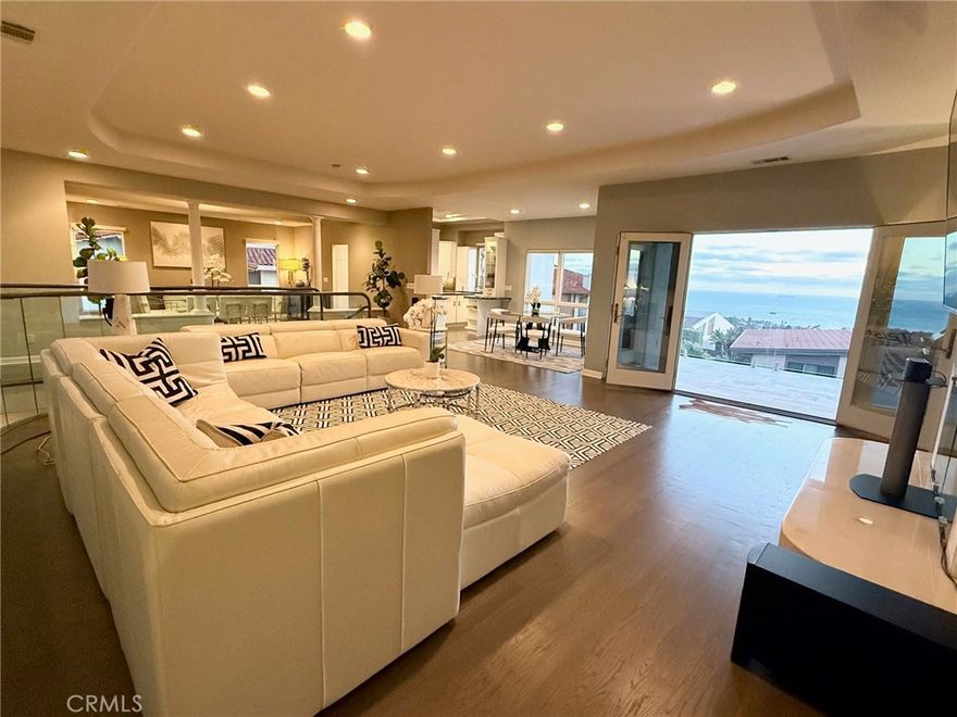 Elegant Coastal Living in Upper Lunada Bay.



Welcome to 2637 Via Olivera, a meticulously upgraded 4 bedrooms, 4 bathrooms estate perched in the heart of Palos Verdes Estate's prestigious Upper Lunada Bay. Home designed by famous architect Russell E Barto brings an inspired yet classic approach to this comfortable and inspired costal living. This 4030 sqft home blends timeless Mediterranean elegance with modern luxury, offering breathtaking ocean views, refined interiors, and resort style amenities on a sprawling 8202 sqft lot. From the moment you step inside, rich French Oak hardwood floors, custom millwork, and abundant natural light set the tone for refined living. The versatile floor plan includes dual primary suite, a sunken living room with a classic fireplace, and a stunning chef's kitchen outfitted with Viking appliances, marble countertops, and a full butler's pantry. Step outside to your private backyard oasis- a professionally landscaped retreat with a saltwater pool/spa, outdoor kitchen, and seamless indoor-outdoor flow, ideal for entertaining or serene sunset evenings. Build on solid bedrock, this home is as secure as it is stylish. Property has a 50 amp Tesla Charger. Located on a tranquil, tree-lined street near top-rated schools, scenic trials, and the bluffs of Palos Verdes, this is California coastal living at its finest.