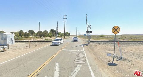 Photo of 212 W Avenue E, Lancaster, CA 93536 (MLS # 26637923)