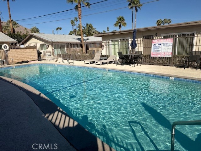 The property is conveniently located across the street from Margaritaville at Vista Chino and Indian Canyon. The property is also located only a few blocks from several schools, and a park and is within close proximity to downtown Palm Springs and all of its amenities.
The property has been renovated both interior and exterior. The renovations include all new exterior painting, exterior foam and stone treatment, all new landscaping, all new lighting, new pool decking, pool furniture, new BBQs in the courtyard, and all new laundry equipment for the laundry rooms.
This unit has updated flooring, new paint, new blinds, new energy-efficient heating, and air conditioning systems, all new appliances, new hardware, and finishes.
