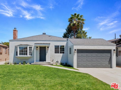 Photo of 9470 S Harvard Boulevard, Los Angeles, CA 90047 (MLS # 26870431)