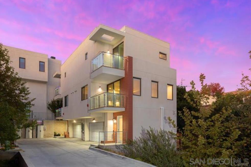 Detached Luxury Row Home. Strictly Electric Home with 14+ OWNED Solar Panels = Net Zero Energy Home! Huge cost savings, potentially little to no SDGE bill. Located in charming Golden Hill, just minutes from Downtown San Diego. This Spacious 3 Story Row Home features 1,328 sq ft with 2. bedrooms and 2.5 bathrooms. Eachh en-suite bath, a 2-car garage, and multiple balconies to soak up the neighborhood views with floor-to-ceiling sliding doors. Kitchen and Baths feature custom cabinets, quartz counters, with stainless steel appliances. This home was built highly efficiently! No Mello Roos!