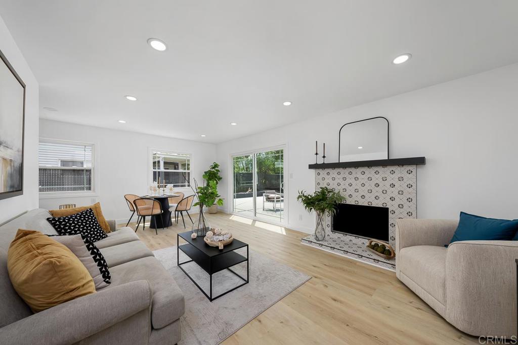 Welcome to 14130 Frame Rd – A Stunning Renovation in the Heart of Poway. Discover modern comfort and timeless style in this beautifully renovated 4-bedroom, 2-bathroom home, ideally located in the highly desirable Poway community. Thoughtfully upgraded from top to bottom, this turn-key gem offers high-end finishes and functional elegance in every room. Step inside to find brand-new vinyl plank wood flooring, fresh interior paint, updated doors, and a strikingly redesigned modern fireplace that adds warmth and character. Energy-efficient windows flood the open-concept living areas with natural light, while recessed lighting and updated light switches/outlets enhance the clean, contemporary feel. The chef’s galley kitchen is a true highlight, featuring sleek quartz countertops, white cabinetry, stainless steel appliances, gas cooking, and a built-in wine cooler—perfect for entertaining or daily living. Both bathrooms have been tastefully remodeled with modern vanities, updated fixtures, and spa-inspired finishes for a luxurious touch. A new roof provides long-term peace of mind and value. Outside, enjoy your private backyard oasis with no direct rear neighbors—an ideal retreat for morning coffee, family time, or weekend gatherings. Located just minutes from parks, boutique shopping, and trendy dining, this home also lies within the top-rated Poway Unified School District, making it perfect for families seeking top-tier education and a strong sense of community. With its impeccable renovations, thoughtful design, and unbeatable location, 14130 Frame Rd is the perfect blend of style, comfort, and convenience. Don’t miss the chance to make this beautifully upgraded home yours!