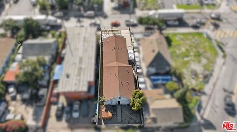 Photo of 1523 E Vernon Avenue, Los Angeles, CA 90011 (MLS # 26795877)