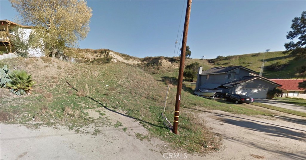 Beautiful residential lot in high demand area of Val Verde, California. Located in the serene surroundings of Val Verde, California, this expansive 14884 square feet (0.34 acrea) vacant lot offers boundless potential for future development. Nestled amidst picturesque mountains, this prime piece of real estate provides a tranquil retreat while being conveniently situated just 5 minutes from the 5 Freeway and 5 minutes to the 126 Freeway, ensuring easy access to nearby amenities and transportation routes. Enjoy the convenience of proximity to shopping centers, with the added bonus of being a mere 10 minutes away from the excitement of Magic Mountain. Don't miss this opportunity to invest in your dream development project in this idyllic location. Buyer to do his own due diligence. Contact us today for more information! OWNER WILL CONSIDER CARRYING ON PAPER!