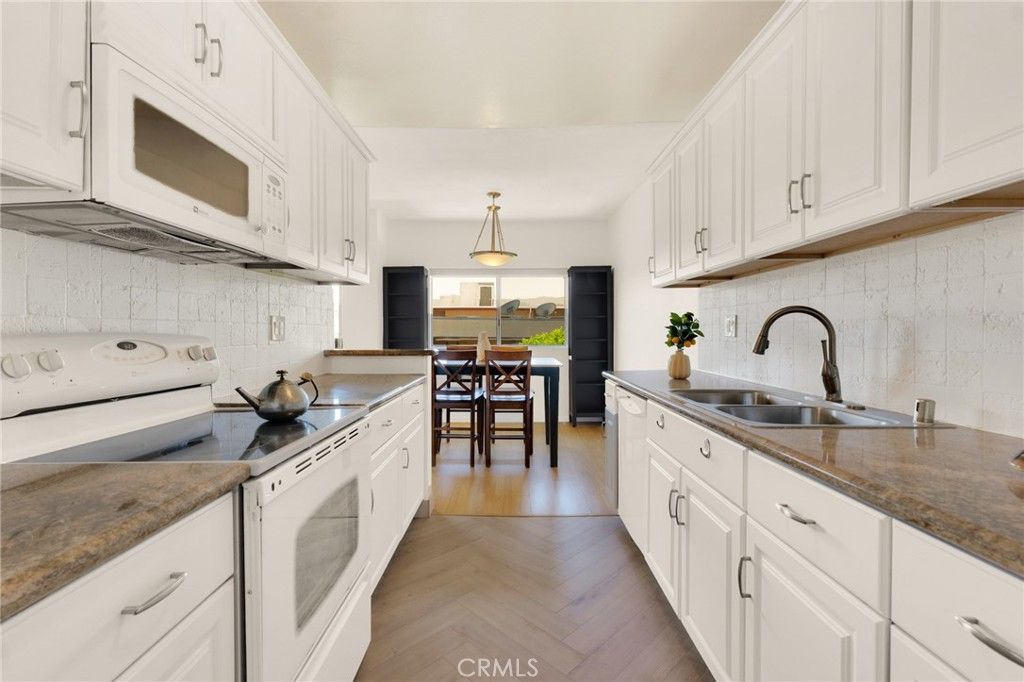 Photo of 5400 Newcastle Avenue #46, Encino, CA 91316 (MLS # SR25177691)