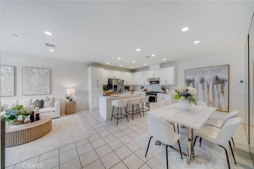 SELLER MOTIVATED!!!Welcome to this exquisite tri-level condo in the prestigious GATED COMMUNITY of Iron Ridge in Portola Hills. This beautiful home boasts 2,322 Sq. Ft of living space, 4 bedrooms, 3.5 baths, 2 car attached garage. On the first floor, you'll be greeted by an open floor plan that seamlessly connects the family room, kitchen, and dining area. The contemporary kitchen boasts white cabinets, a large island with bar-height counter seating, quartz countertops, stainless steel appliances, making it a chef’s dream. The second level offers 3 bedrooms as well as 2 full bathrooms, a laundry room for your added convenience. The primary ensuite boasts double sinks with ample cabinet space, a walk-in shower, and a spacious walk-in closet. The Third level is designed for ultimate comfort and flexibility, with a versatile loft space ideal for a home office, theater, or easily converted into a fifth bedroom. This level also includes a guest bedroom, guest bathroom. Additionally, a large city park just outside the gates offers the perfect setting for evening sunsets, dog walks, or pickleball matches. With the majestic backdrop of Saddleback Mountain and proximity to top-rated schools, such as Portola Hills Elementary, this community provides a serene environment for relaxation, growth, and outdoor recreation. Enjoy the security and