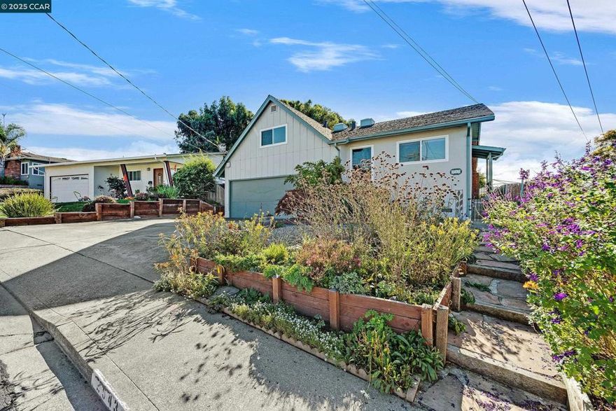 Wonderful Court Location in the Pinole Linda Heights neighborhood. Special 2-Story Home. Primary bedroom suite upstairs. Lovely hardwood floors throughout. Enjoy deck off kitchen and panoramic views! Bonus room and 1-car parking in garage. Side yard access to private back yard. Front yard is a Monarch Butterfly Waystation! Landscaped to attract and sustain all pollinators like bees, butterflies, & hummingbirds. Easy drive to Kaiser Medical Center, Sprouts, I80 East and West, Trader Joe's, Pinole Middle & Pinole Valley High. Walk to Collins Elementary. Property has been well maintained and a family home since 1988. Now it's your turn!