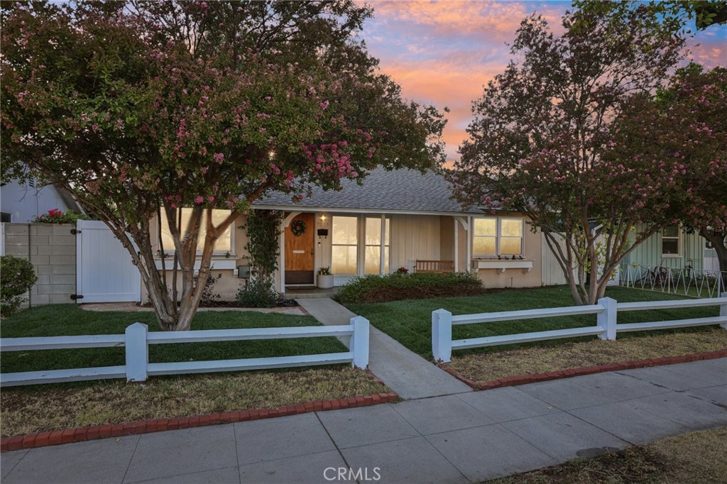 Welcome to 7813 Louise Avenue — a delightful Ranch-style retreat tucked into a tree-lined Northridge pocket right on the edge of Lake Balboa. This charming 2-bedroom, 1-bath home offers 909 sq ft of thoughtfully maintained living space on a spacious 6,000 sq ft lot with alley access. The detached garage, currently outfitted as a private studio/office with ductless HVAC, is perfect for creatives, remote professionals, or those exploring ADU potential.
Inside, natural light highlights the home's vintage parquet wood flooring, open-concept living and dining area, and a cozy fireplace with whitewashed brick detail. A graceful arched entryway leads to the kitchen, featuring stainless steel appliances, ample cabinetry, and a window-framed view of the vibrant backyard. Step through sliding glass doors into your outdoor oasis, ideal for summer barbecues, hammock naps under mature shade trees, or evenings of wine and conversation beneath the stars.
This home offers lifestyle flexibility, whether you're a first-time buyer, young couple, or investor considering SB-9 or ADU opportunities. With no HOA restrictions, you'll have the freedom to create, expand, and enjoy. Just minutes from shopping, dining, major commuter routes, and Lake Balboa's trails and recreation, it's a location that balances convenience and charm.
Special Financing Available: Secure an interest rate up to 1% below market (currently under 6%), with as little as 0% down, no mortgage insurance, no lender fees, and up to $6,500 in credits. Best of all, this program is not income-restricted.
Don't miss this Northridge gem, blending character, opportunity, and location into one perfect package.